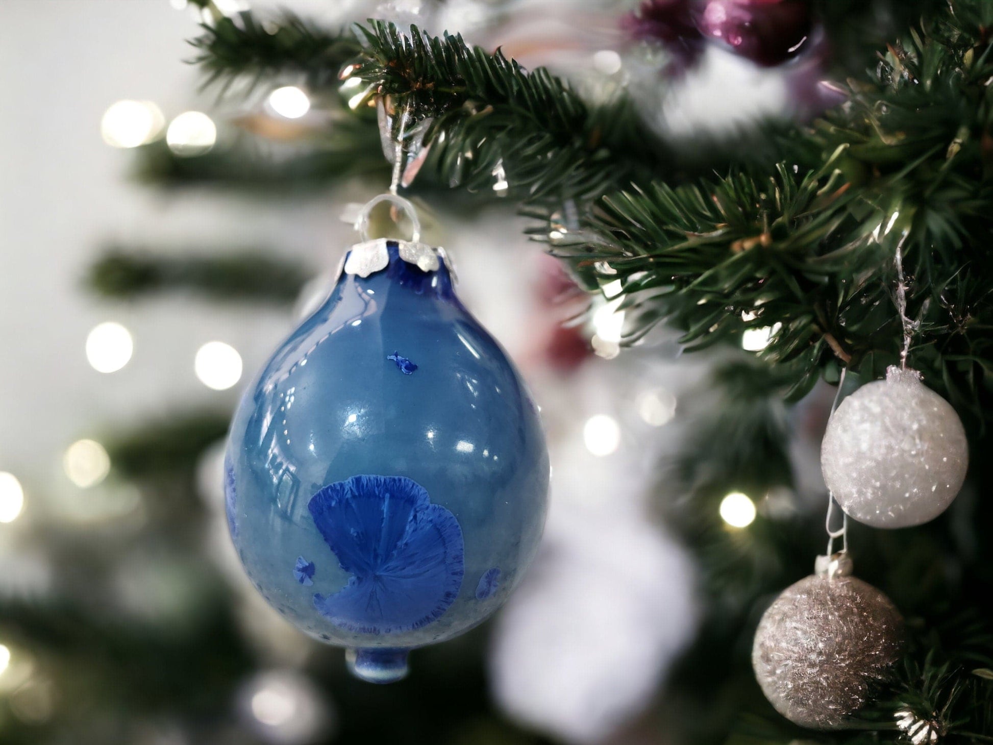 Porcelain holiday bauble with crystalline glaze decoration