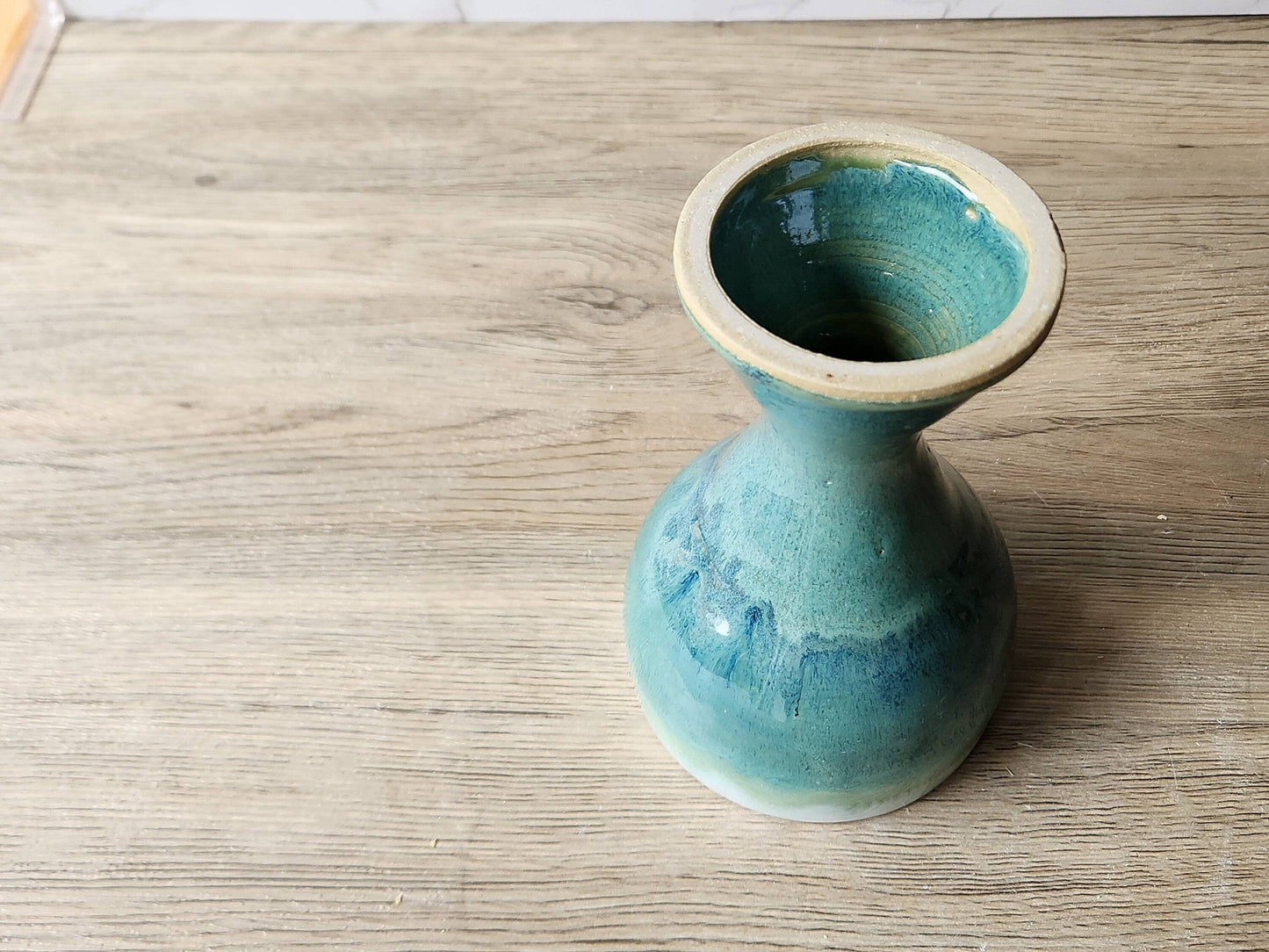 Underside of Elegant handmade wine cup with natural glaze finish