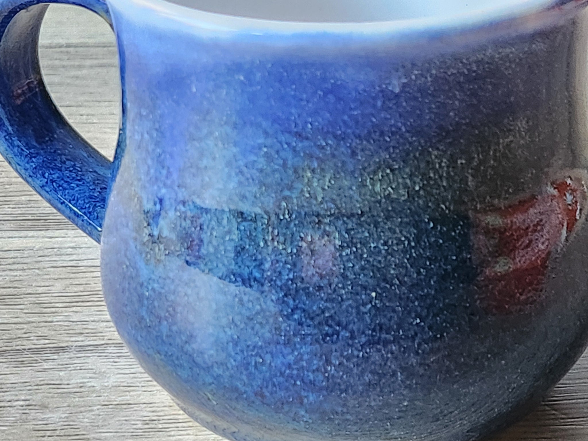 Close-up of the glaze for the Handmade pottery mug, a Ceramic mug made in Australia.