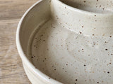close up of speckled cream glaze on the Rustic handmade chip and dip bowl – ceramic kitchenware