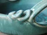 Close up of Handmade stoneware serving bowl with layered glaze finish