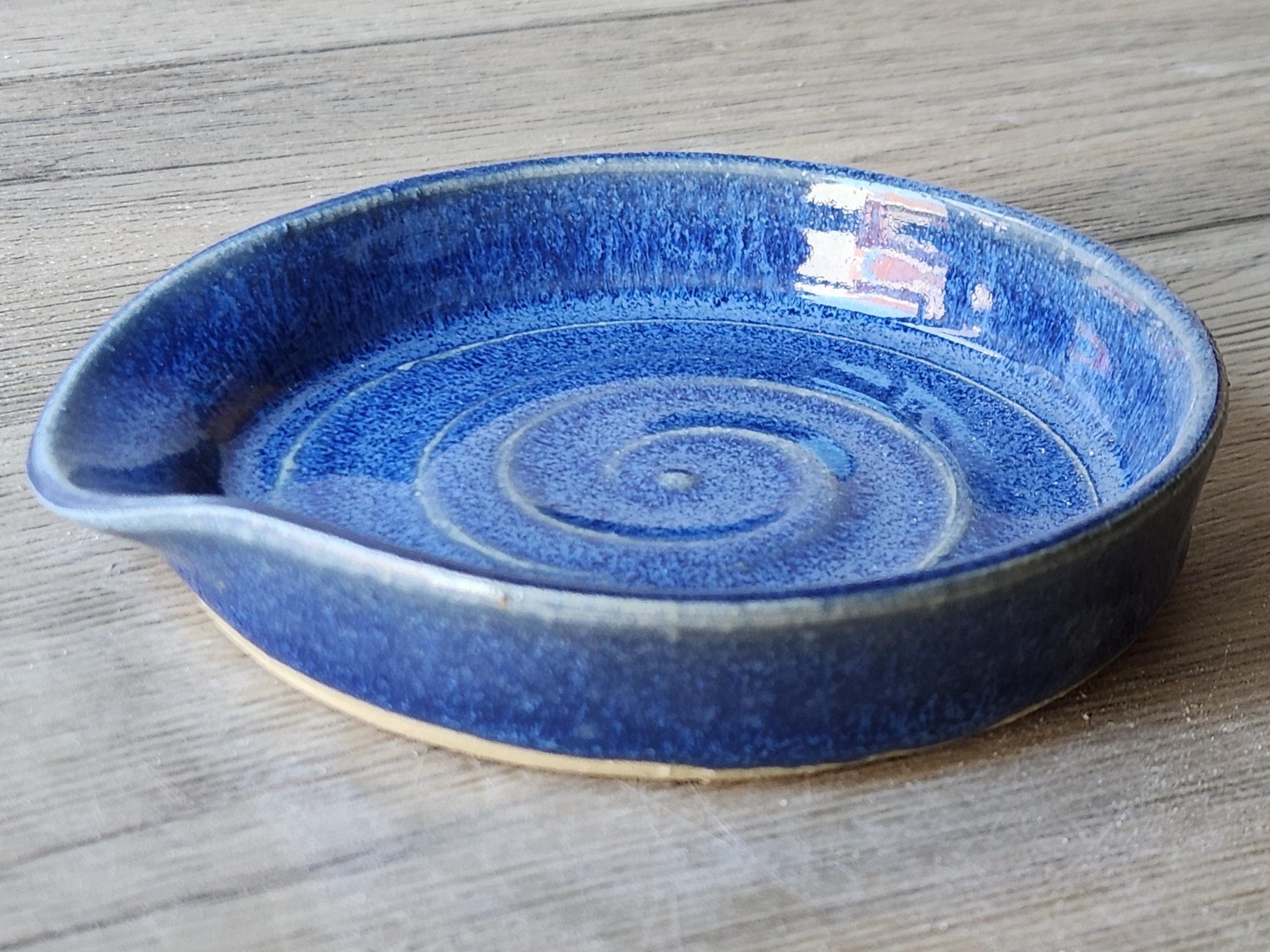 Handmade pottery spoon rest for cooking utensils