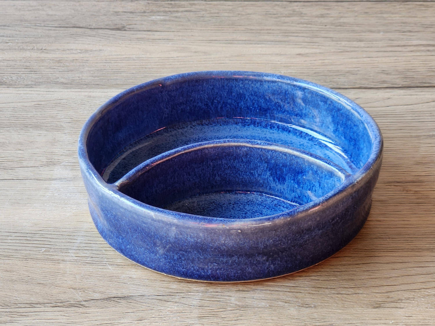 Australian Blue pottery snack bowl with dual compartments a gift idea