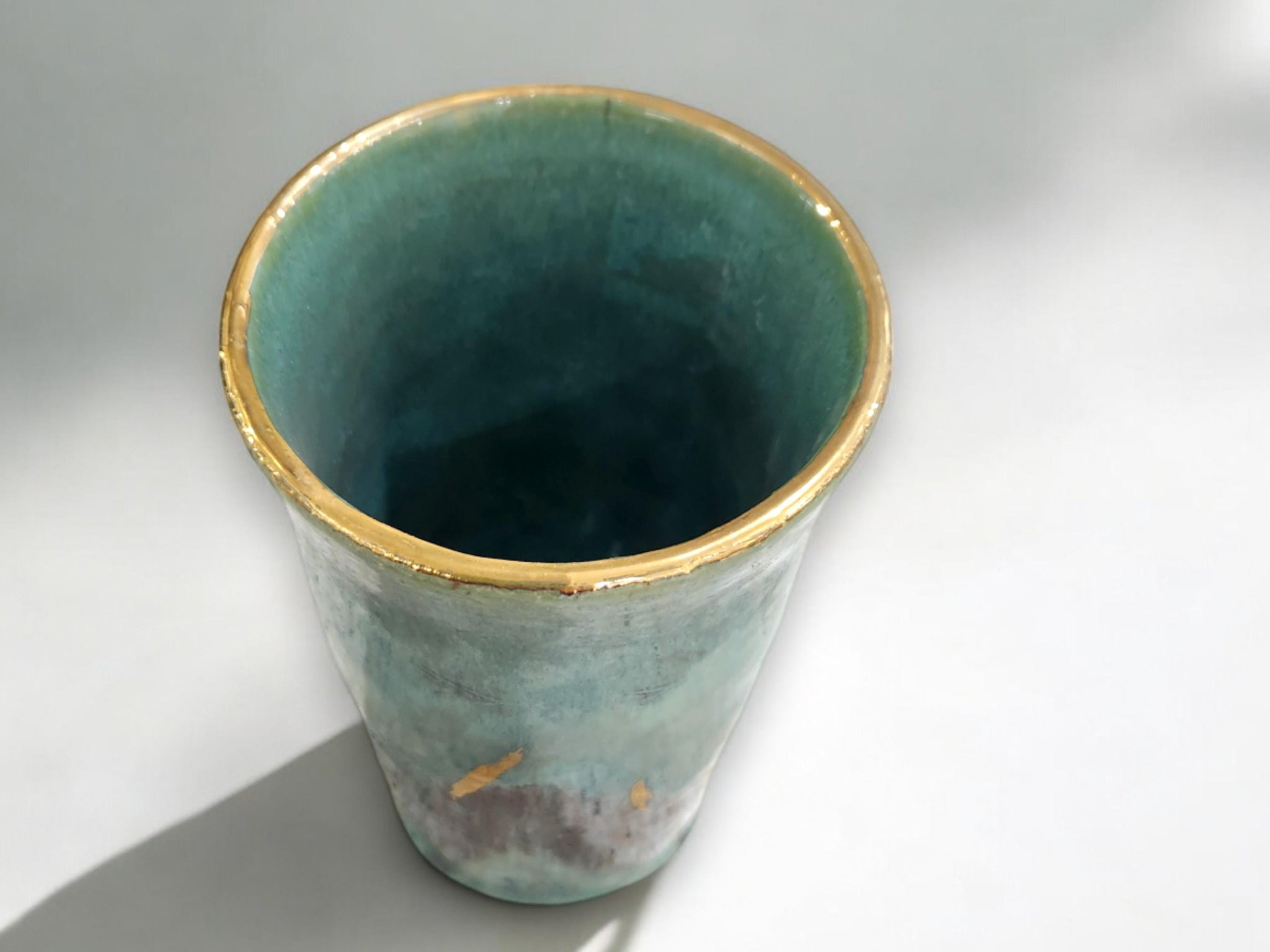 Handmade ceramic vase - pottery vase with mottled multi-glaze with gold highlights and trim -