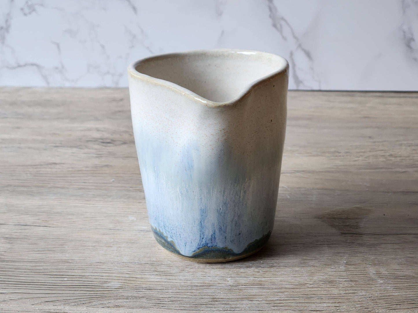 Rustic handmade pottery jug for milk or cream