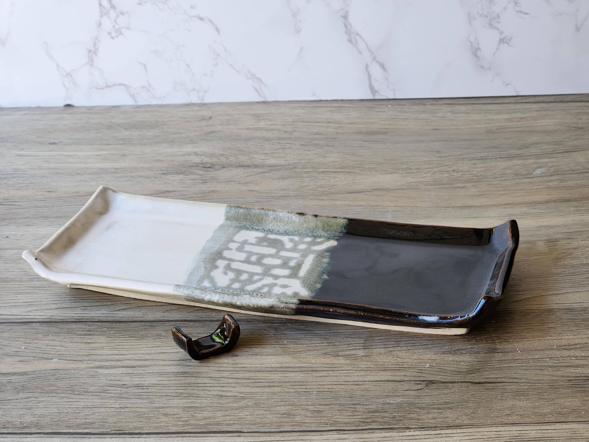 Handmade stoneware serving platter in cream and chocolate glaze