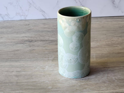 Glossy porcelain cylinder vase with soft green glaze and white crystals- handmade in Melbourne
