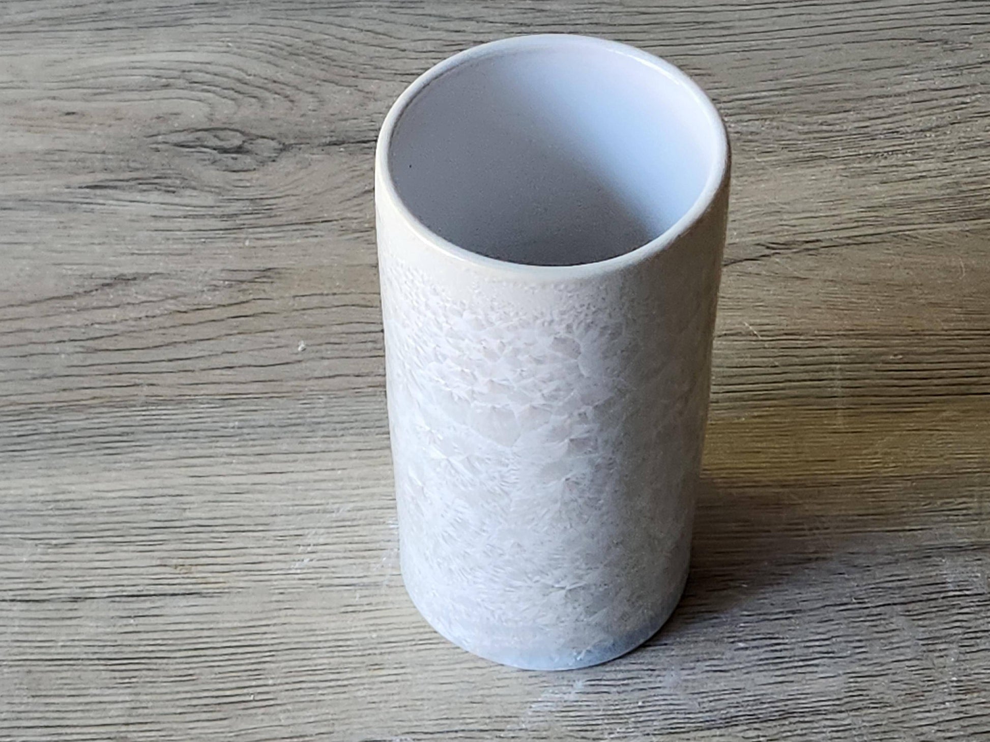 Handmade Cylindrical ceramic vase – toothbrush or pen holder with a white crrystalline glaze