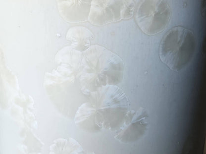 Close up of crystals on One-of-a-kind crystalline glaze vase