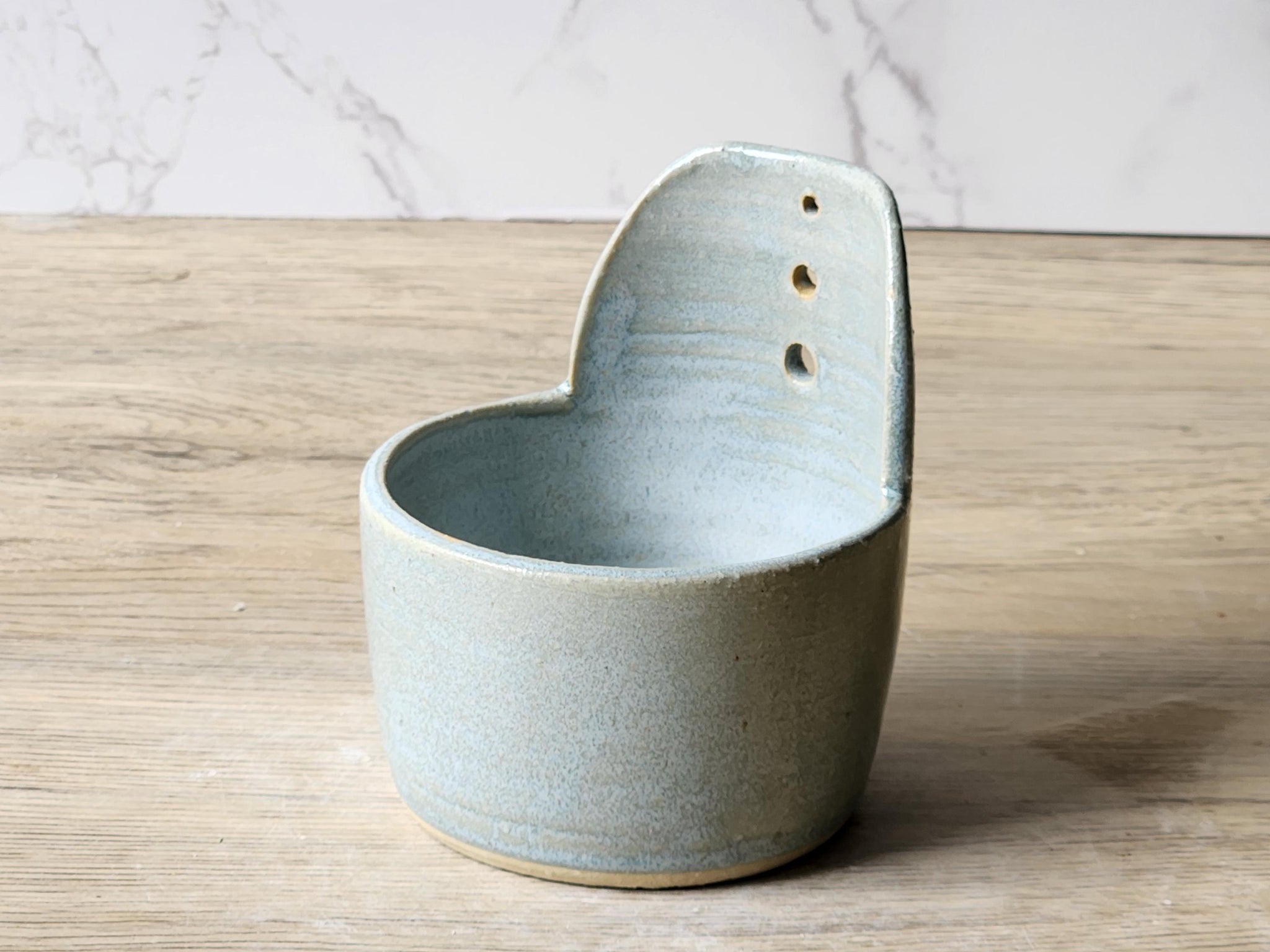 light blue-grey stoneware herb stripper for parsley, basil, and rosemary