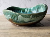 Large stoneware fruit bowl with hand-altered form
