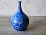 Wheel-thrown porcelain vase with crystalline finish