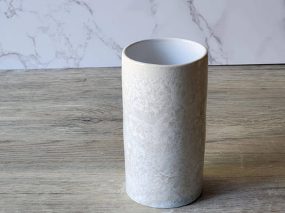 Handmade pottery tumbler with white crystalline glaze