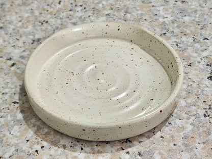 Rustic cream pottery spoon holder for cooking utensils