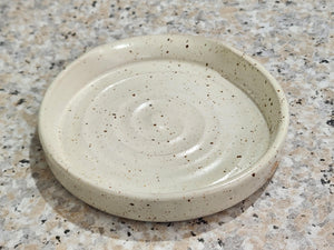 Rustic cream pottery spoon holder for cooking utensils
