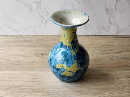 Blue crystal bloom design on mustard porcelain vase – artisan ceramics