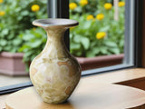 Handmade ceramic vase with cream crystalline glaze