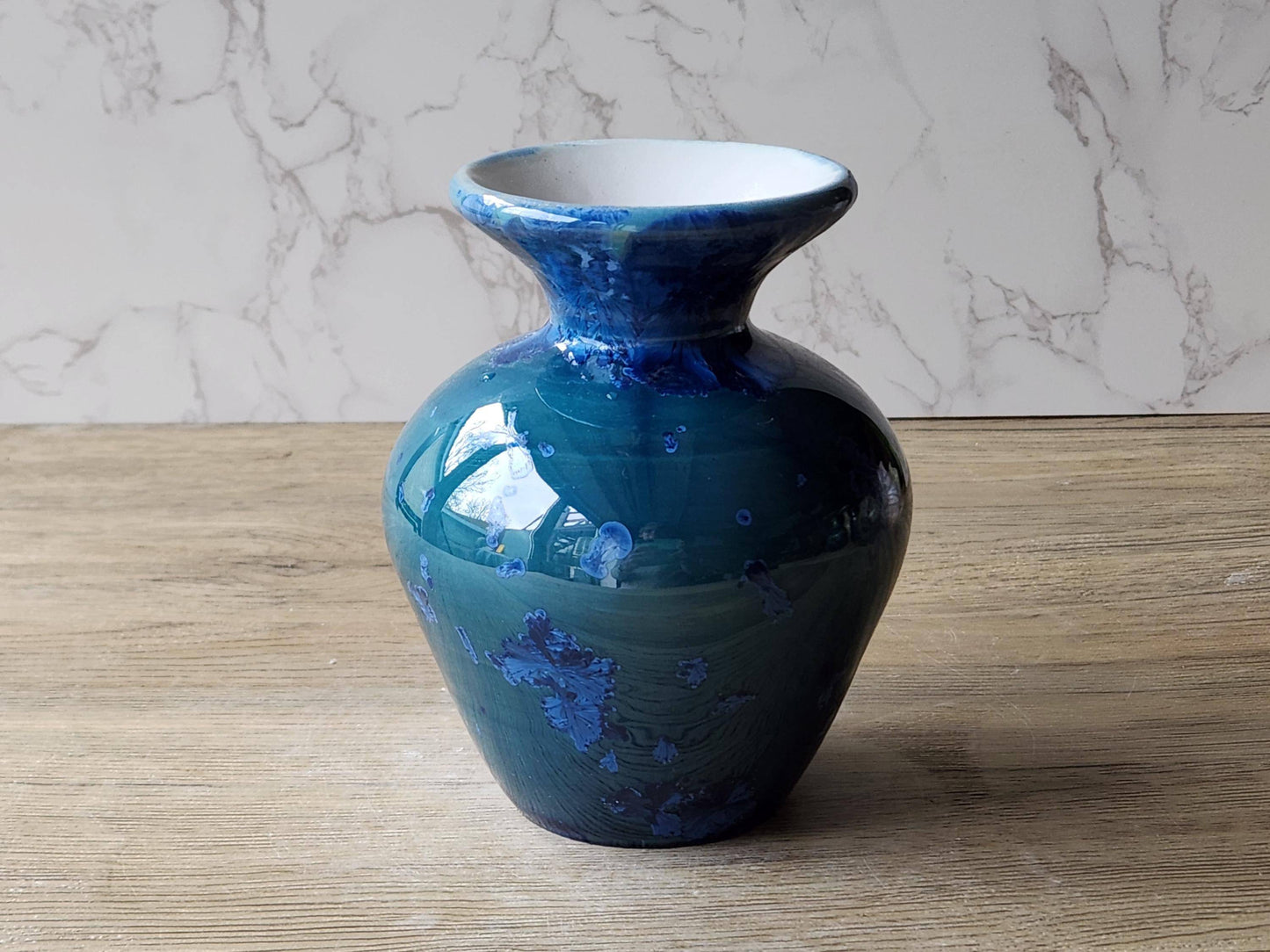 Blue crystalline glaze porcelain vase with satin-white interior