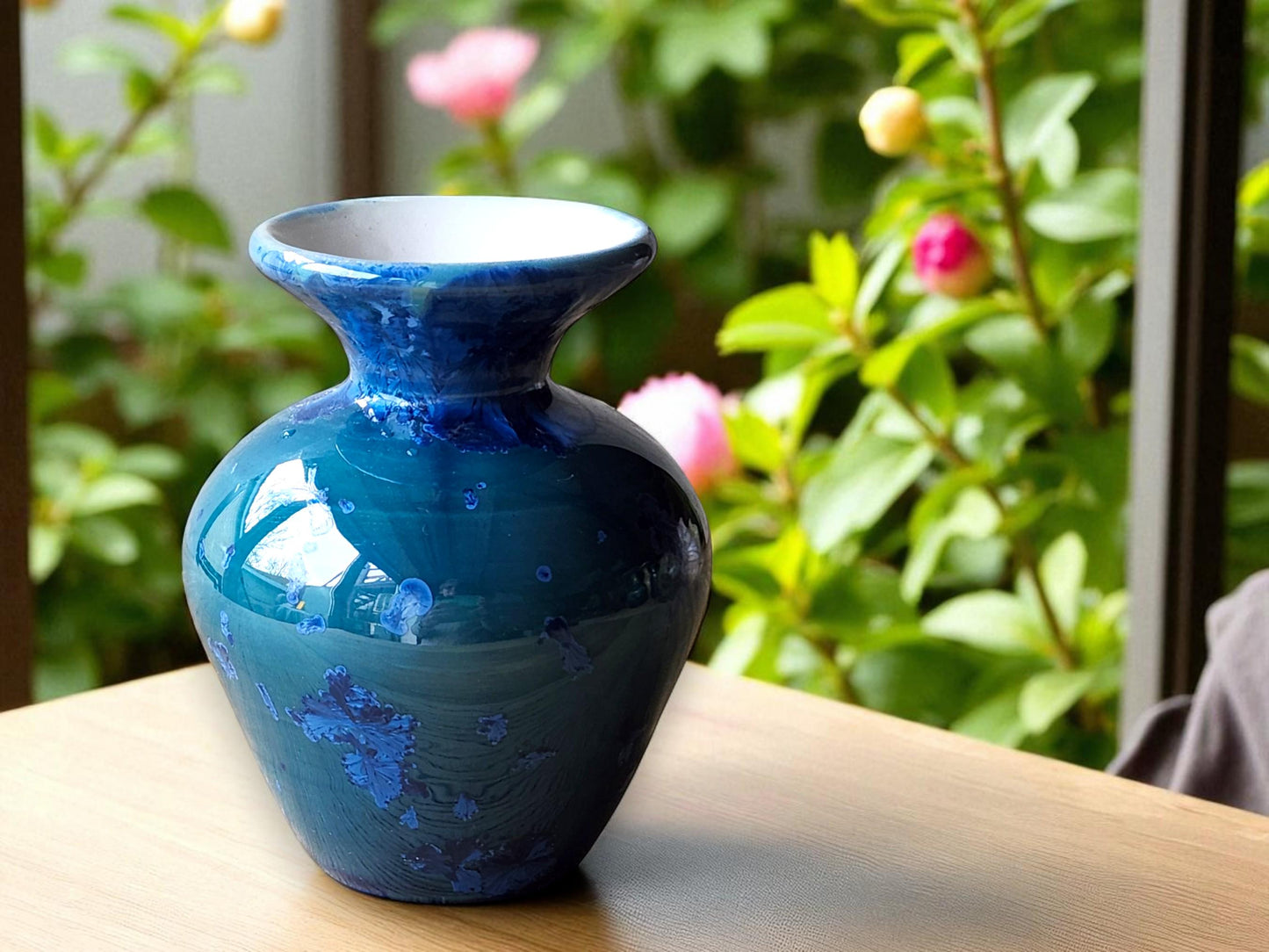 Handmade porcelain vase with blue-on-blue crystalline glaze