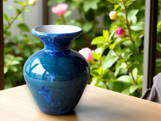Handmade porcelain vase with blue-on-blue crystalline glaze