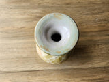 Wheel-thrown porcelain vase with natural crystal patterns