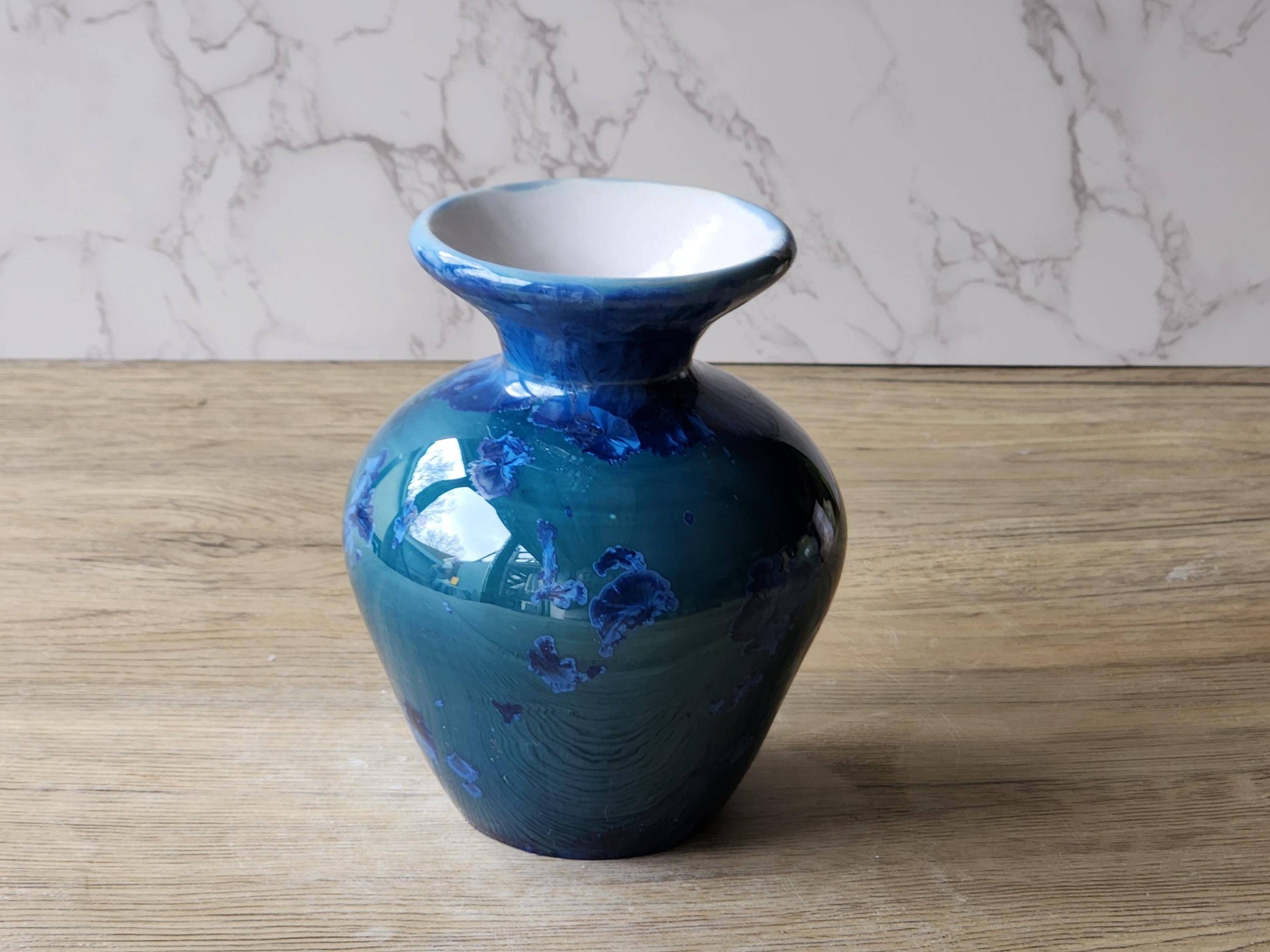 Artistic crystalline glaze vase in layered blue tones