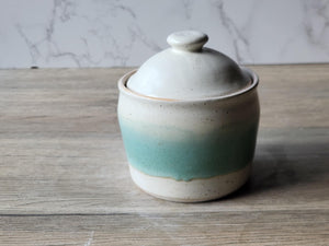 Unique gift idea -A handmade ceramic jar glazed in soft speckled cream with a vertical panel of spearmint green. 