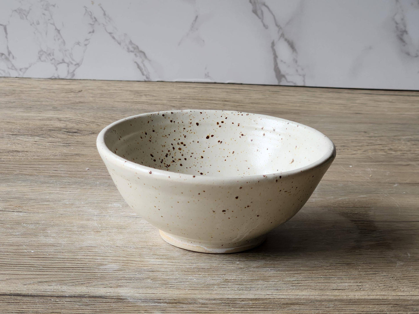 Small dish for salt or sauce in speckled cream glaze from Buxton Pottery