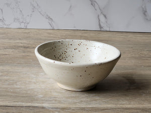 Small dish for salt or sauce in speckled cream glaze from Buxton Pottery