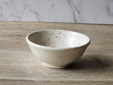 Small dish for salt or sauce in speckled cream glaze from Buxton Pottery