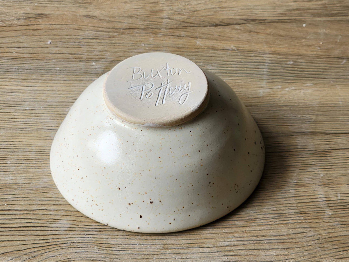 Underside of small ceramic bowl from Buxton Pottery