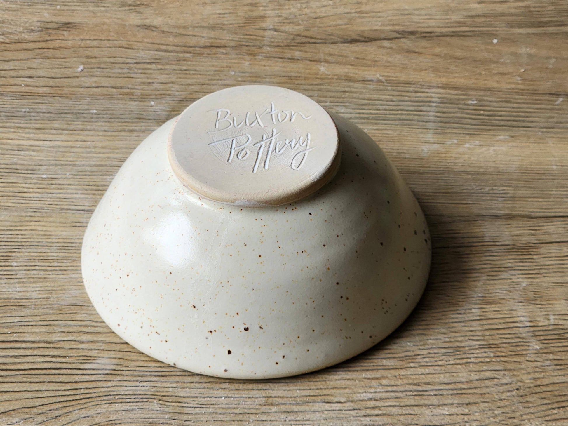 Underside of small ceramic bowl from Buxton Pottery