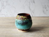 Rustic handmade ceramic tumbler cup with glossy dark lining