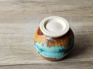 Stoneware yunomi cup with earthy layered glaze
