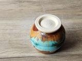 Stoneware yunomi cup with earthy layered glaze