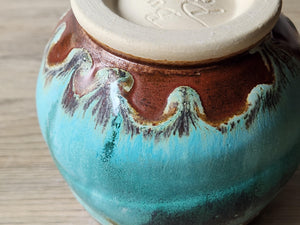 Close up view of the glaze of the rustic handmade yunomi, teacup.