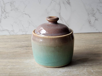 Handmade ceramic jar for kitchen storage or decorative use