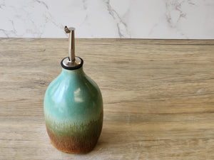 Handmade pottery ceramic oil and vinegar bottle with spout