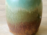 Close up of glaze on the Unique handmade ceramic olive oil pourer – rustic pottery gift