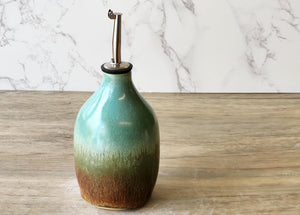 Wheel-thrown pottery oil cruet with food-safe glaze