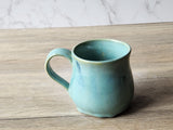 Green ceramic mug inspired by Australian coastlines