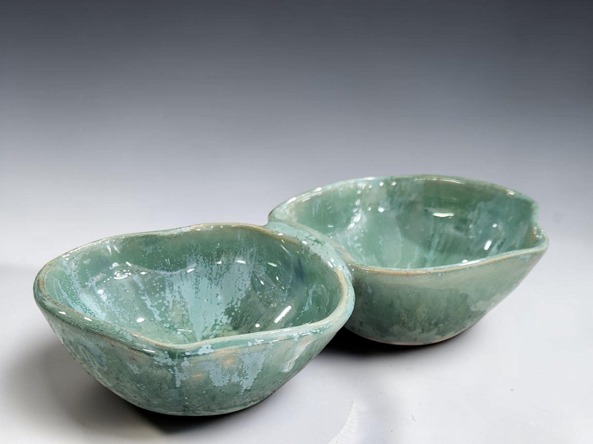 Australian handmade pottery serving bowl with two compartments, designed for olives, nuts, dried fruit and grazing platters.