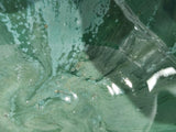 Close up of an Australian handmade pottery serving bowl with two compartments, designed for olives, nuts, dried fruit and grazing platters.