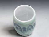 Top view of handmade Australian ceramic vase with glossy landscape-inspired glaze.