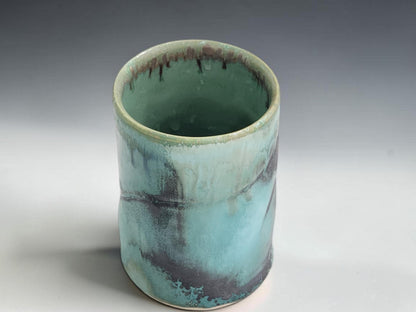 Australian handmade ceramic tumbler with glossy turquoise glaze and natural handmade variation