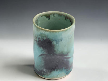 Wheel-thrown pottery cup in green blue glaze, handmade in Melbourne studio