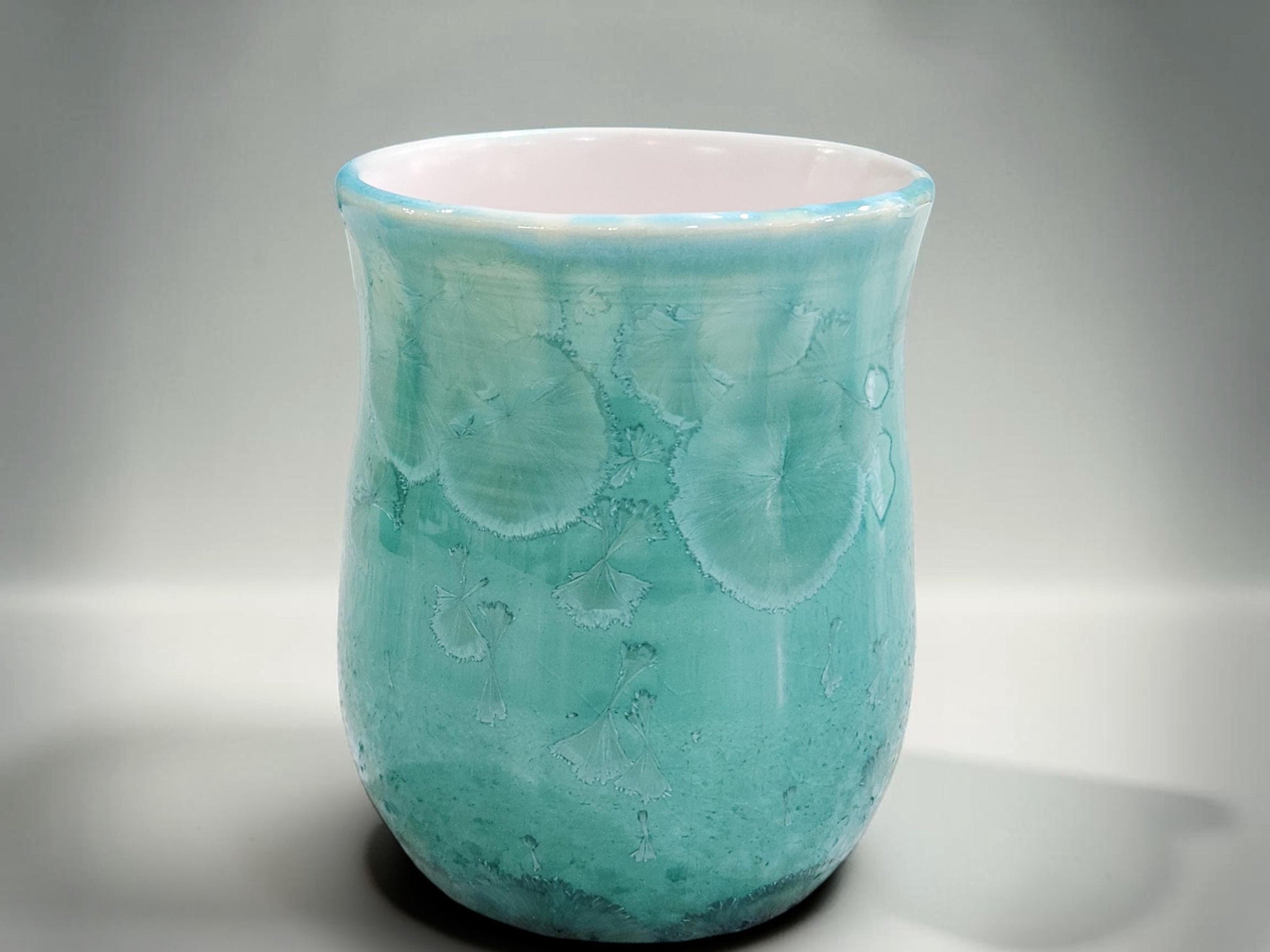 Green crystalline tea mug made from high-fired porcelain in Australia