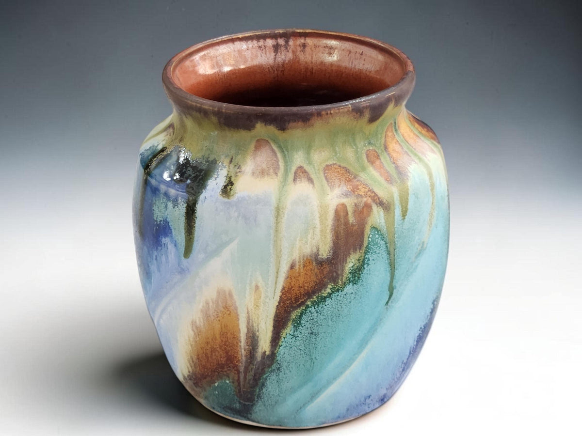 Australian handmade pottery vase with turquoise blue brown and amber glaze