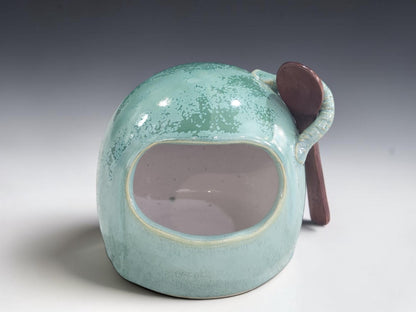 Front view of handmade green stoneware salt pig with wide opening