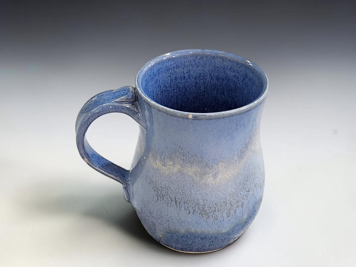 Mottled soft blue and deep blue glaze on handcrafted Australian ceramic mug